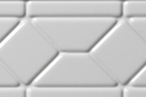 A white tile wall featuring a geometric pattern of interlocking shapes