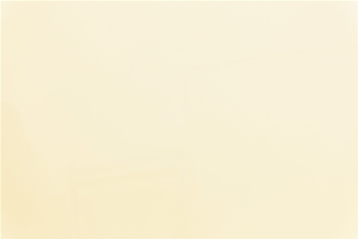 A white wall and ceiling with a simple white chair in the foreground, creating a minimalist interior space-1