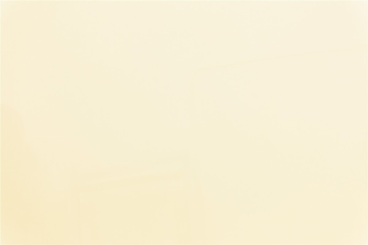 A white wall and ceiling with a simple white chair in the foreground, creating a minimalist interior space-2